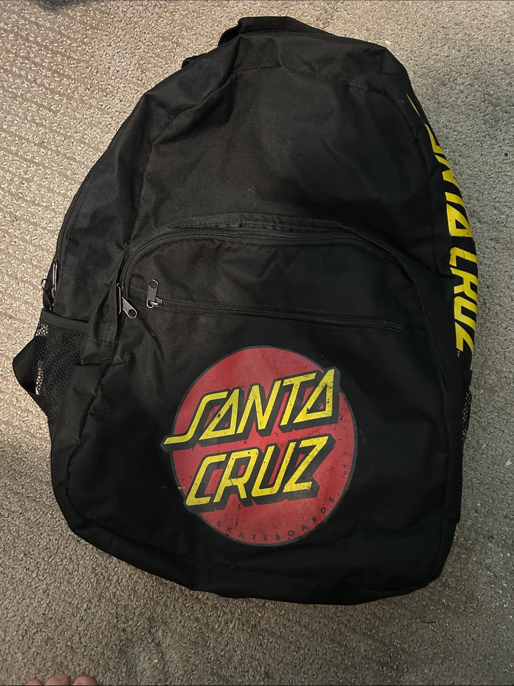Santa Cruz Skateboards Black Backpack with Yellow and Red Logo